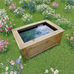 Bassin préformé 365 L Quadra avec cadre en bois dans un jardin fleuri – installation hors-sol décorative