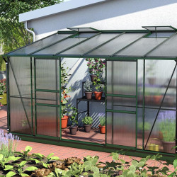 Serre adossée grande surface avec ventilation et panneaux isolants pour développement de légumes et herbes