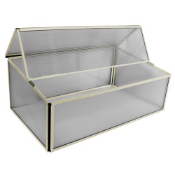 Mini serre pour terrasse urbaine offrant microclimat stable pour plantations