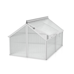 Fenêtres de toit ouvrables sur mini‑serre pour ventilation naturelle et croissance des plantes 